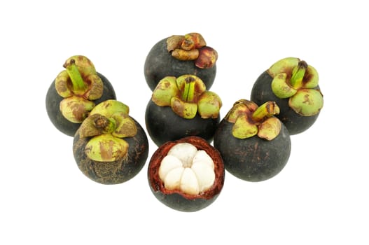 Group of black and green mangosteen isolated on white background.