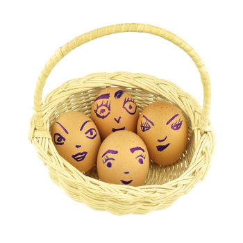 Happy and fun emoticons on empty eggshell in basket isolated with white background.