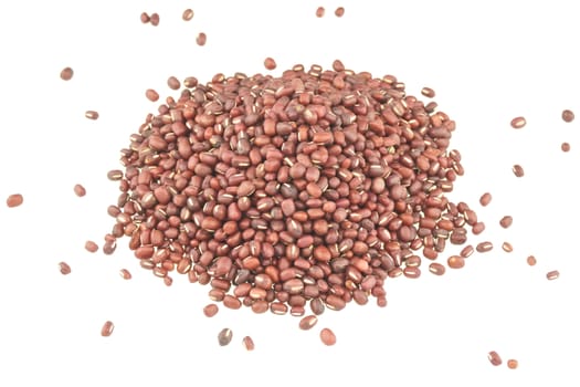 Stack red dry bean are spread isolated with white background.
