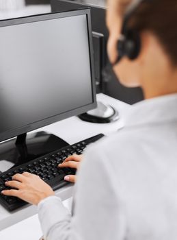 business, office, school and education concept - female helpline operator with headphones