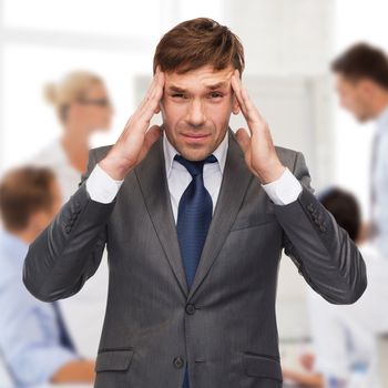 business and office, stress, problem, crisis concept - stressed buisnessman or teacher having headache