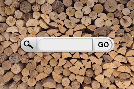 Search bar in browser. Wood chopped firewood on background