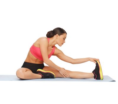fitness, sport, training, gym and lifestyle concept - beautiful sporty woman doing exercise on the floor