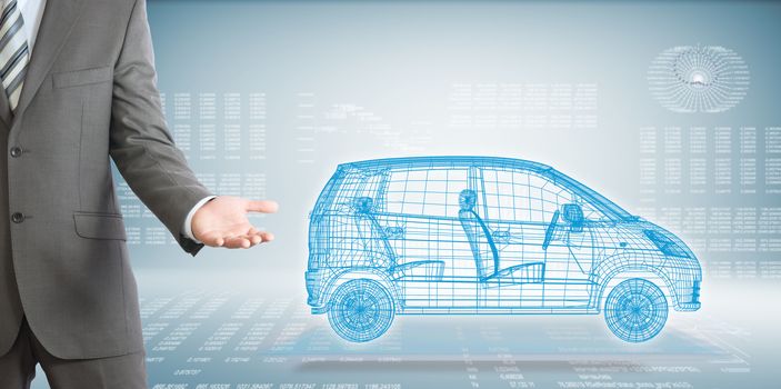 Businessman points hand on wire frame car. High-tech graphs at backdrop