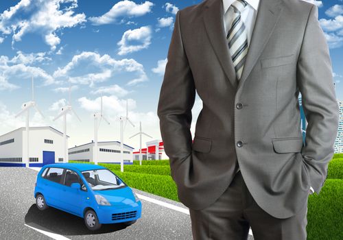 Businessman standing with hands in pockets. Road, skyscrapers and industrial area as backdrop