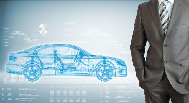 Businessman standing with hands in pockets. On background of the high-tech wire frame car and graphs