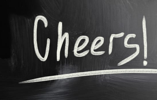 cheers handwritten with chalk on a blackboard