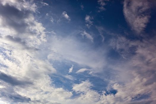 White easy clouds in the blue sky