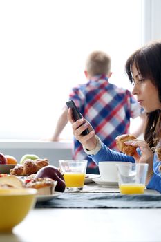 Family. Mother during breakfast