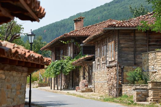 Street with old houses in Zheravna village, Bulgaria