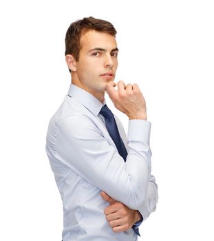 business and office, people concept - pensive young buisnessman