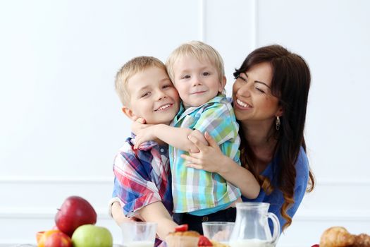 Mother and two brothers during family breakfast