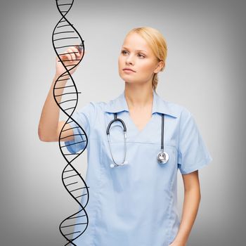 healthcare, medical and new technology - young doctor or nurse drawing dna molecule on virtual screen