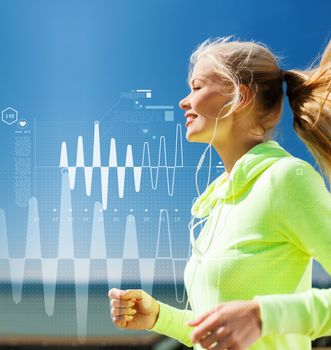 sport, fitness, exercise and lifestyle concept - smiling woman doing running with earphones outdoors