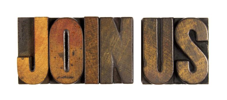The words JOIN US written in vintage wood letterpress type