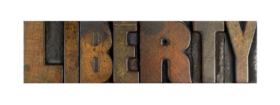 The word LIBERTY written in vintage letterpress type
