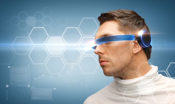 future technology concept - handsome man with futuristic glasses