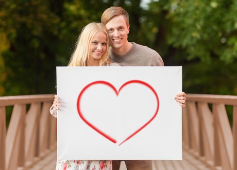 summer holidays, love, tourism, relationship and advertisement concept - romantic couple on the bridge with white board and heart on it