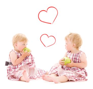 children and happiness concept - two adorable twins with apples over white