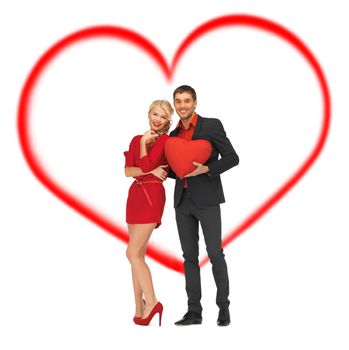 love and relationship concept - beautiful couple holding big heart