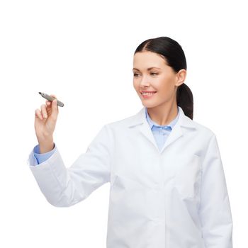 healthcare, medical and technology concept - young female doctor without stethoscope writing something in the air