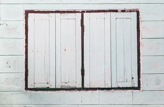 old windows on block wall,background