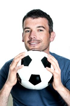 closeup of passionate soccer player with white and black balloon