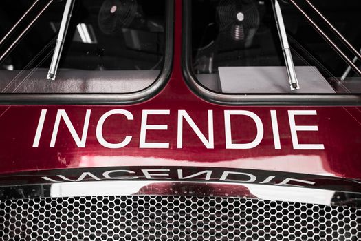 Red Firetruck Details of the Front with "Incendie" Wording