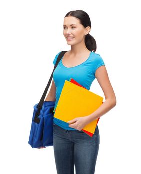 education and people concept - smiling student with bag and folders standing