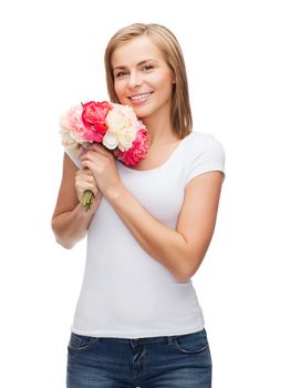 holidays, love and flowers concept - young woman with bouquet of flowers