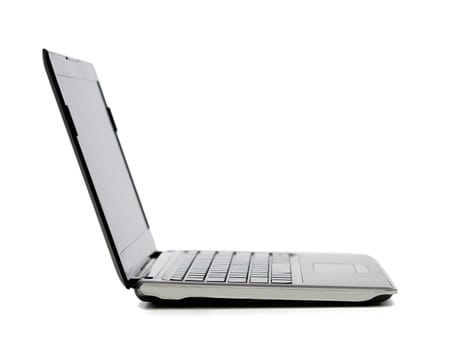 technology and advertisement concept - laptop computer with blank black screen