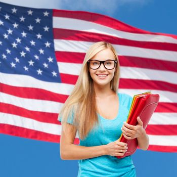 school, travel, tourism and education concept - smiling student with folders