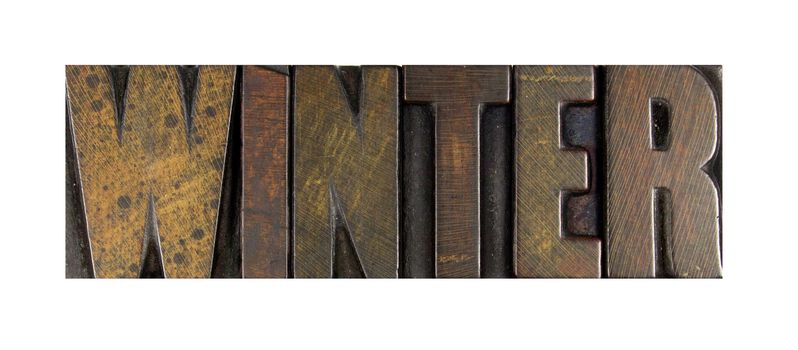 The word WINTER written in vintage letterpress type