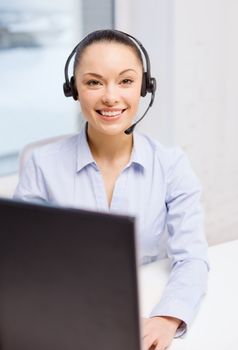 business, communication and call center concept - friendly female helpline operator with headphones