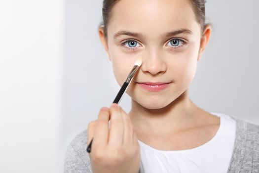 Beautiful girl in a delicate makeup