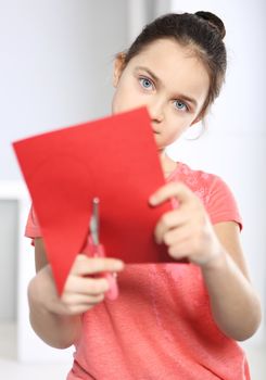 Caucasian girl with card for Valentine's Day or Mother's Day