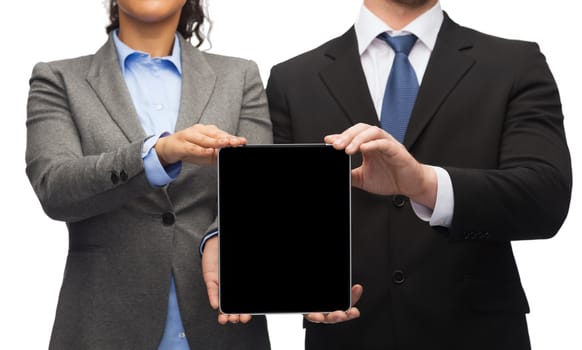 business, technology and internet concept - businessman and businesswoman with blank black tablet pc screen