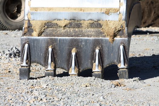 A big excavator bucket close up