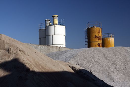 View of stone quarry with silos