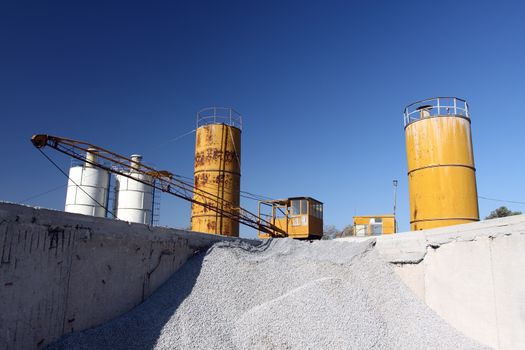 View of stone quarry with silos