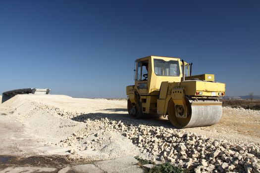 Road roller in work on the new highway