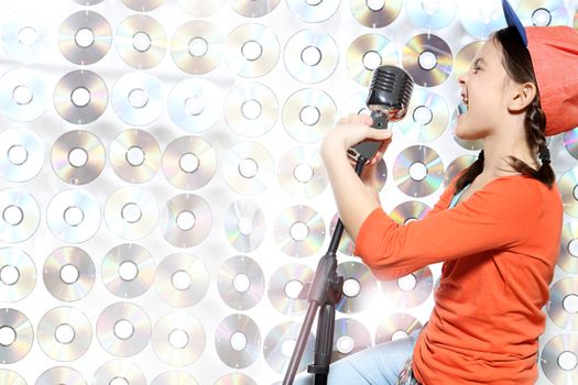 Singing girl in the orange cap