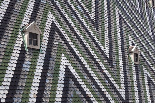 Detailed view of colorful wooden roof shingles.