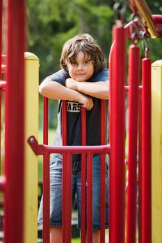 Boy playing outside in a playground