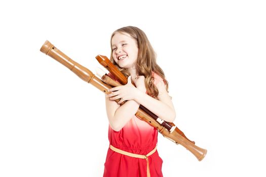 young girl with recorders and white background