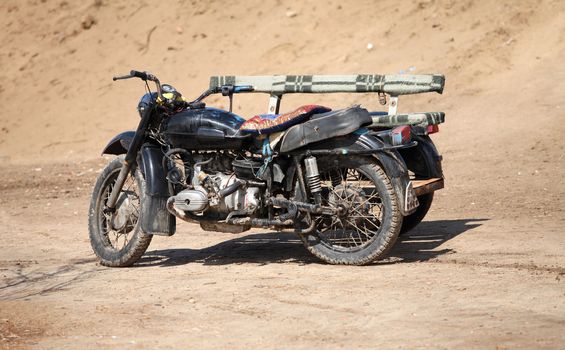old heavy motorcycle with sidecar