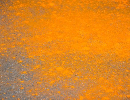 Orange powder on the floor during Holi festival in Kathmandu, Nepal