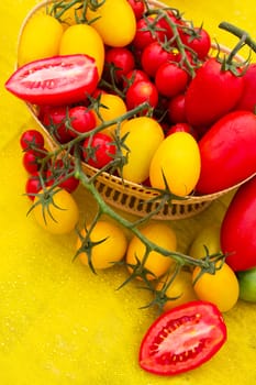 Juicy red and yellow tomatoes on the table