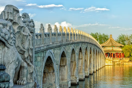 The Famous 17 arch lion bridge in Summer Palace outside of Beijing, China.