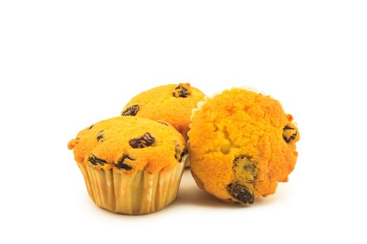 Raisin muffins on white background